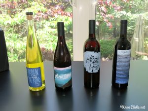 four bottles of winc wine
